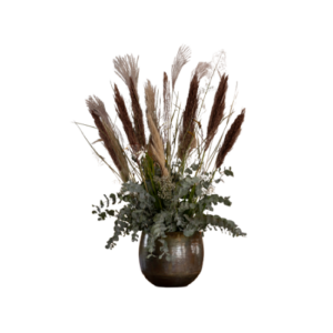 Eyecatcher seizoensbloemen opgemaakt in bijpassende vaas